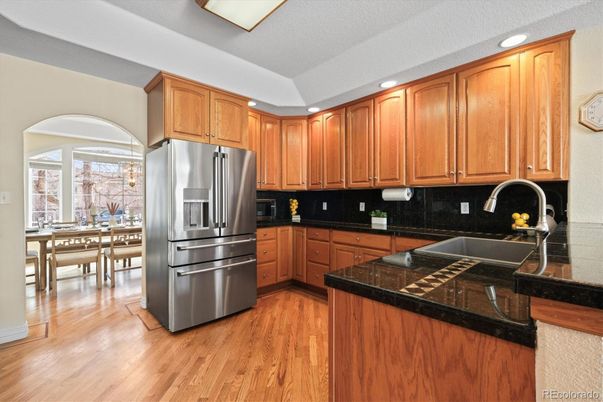 Dining room, Interior, Kitchen, Recessed Lighting, Stainless Steel Appliances, Wood Texture Flooring