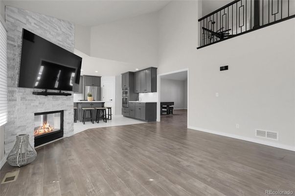 Fireplace, Interior, Kitchen, Recessed Lighting, Wood Texture Flooring
