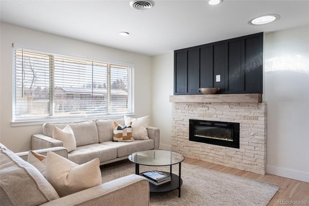 Fireplace, Interior, Living room, Recessed Lighting, Wood Texture Flooring