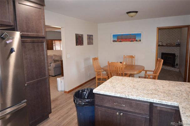 Dining room, Fireplace, Interior, Kitchen, Stone Walls, Wood Texture Flooring