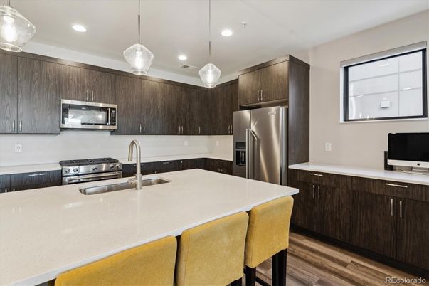 Interior, Kitchen, Pendant Lights, Recessed Lighting, Stainless Steel Appliances, Wood Texture Flooring