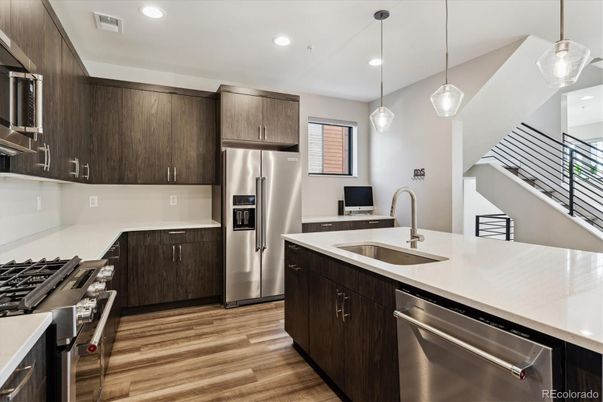 Interior, Kitchen, Pendant Lights, Recessed Lighting, Stainless Steel Appliances, Wood Texture Flooring