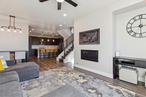 Fireplace, Interior, Kitchen, Pendant Lights, Recessed Lighting, Stainless Steel Appliances, Wood Texture Flooring