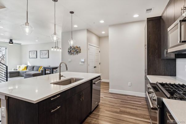 Interior, Kitchen, Pendant Lights, Recessed Lighting, Stainless Steel Appliances, Wood Texture Flooring