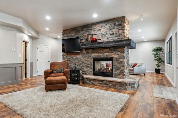 Fireplace, Interior, Recessed Lighting, Stone Walls, Wood Texture Flooring
