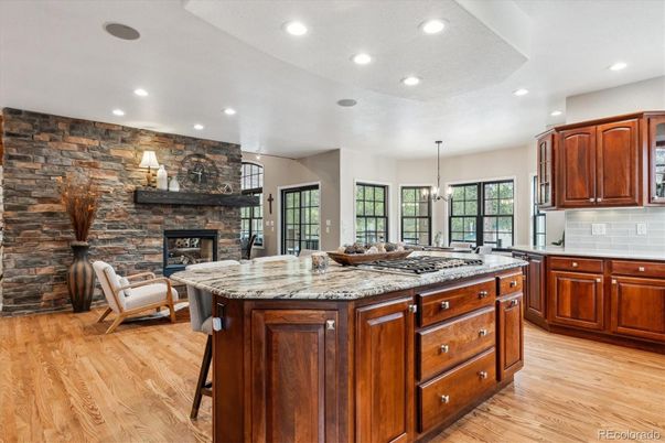 Fireplace, Interior, Kitchen, Pendant Lights, Recessed Lighting, Stone Walls, Wood Texture Flooring
