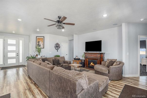 Fireplace, Interior, Living room, Recessed Lighting, Wood Texture Flooring