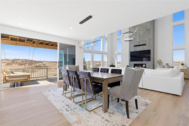Dining room, Fireplace, Interior, Living room, Pendant Lights, Recessed Lighting, Wood Texture Flooring
