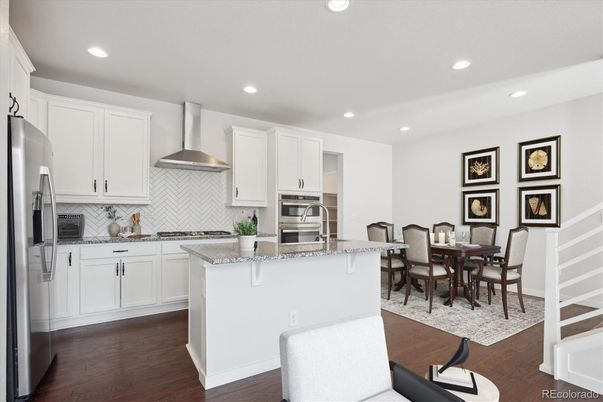 Dining room, Interior, Kitchen, Recessed Lighting, Stainless Steel Appliances, Wood Texture Flooring