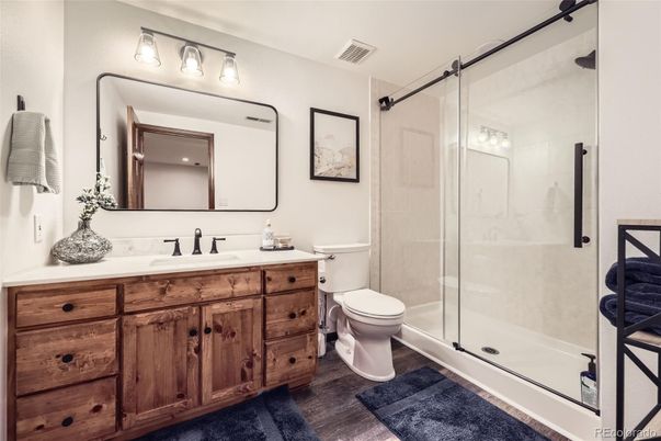 Bathroom, Dual Sink Vanities, Glass Shower, Interior, Wood Texture Flooring