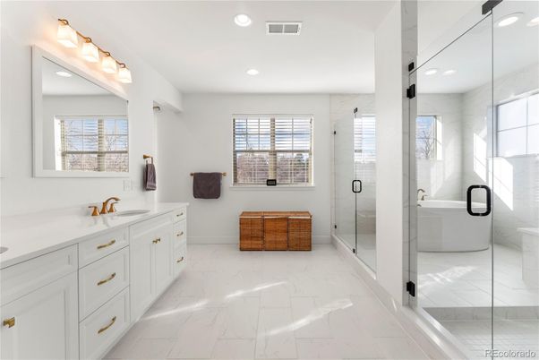Bathroom, Dual Sink Vanities, Free Standing Baths, Glass Shower, Interior, Marble, Marble Walls, Recessed Lighting
