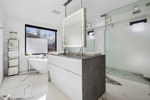 Bathroom, Dual Sink Vanities, Free Standing Baths, Interior, Marble, Recessed Lighting