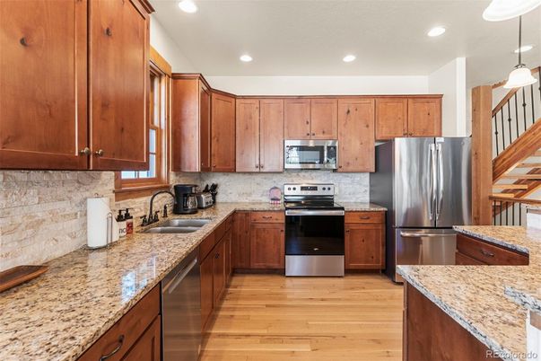Interior, Kitchen, Pendant Lights, Recessed Lighting, Stainless Steel Appliances, Wood Texture Flooring