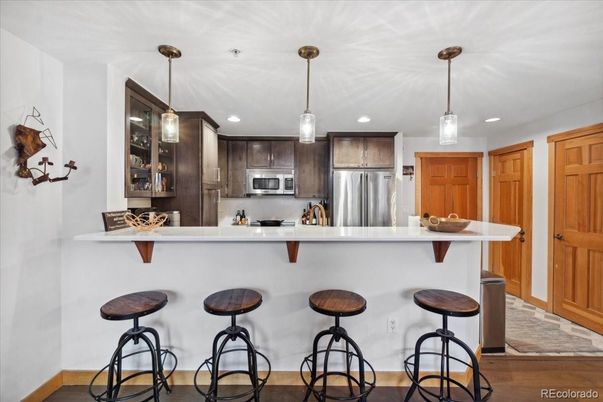Interior, Kitchen, Pendant Lights, Recessed Lighting, Stainless Steel Appliances, Wood Texture Flooring