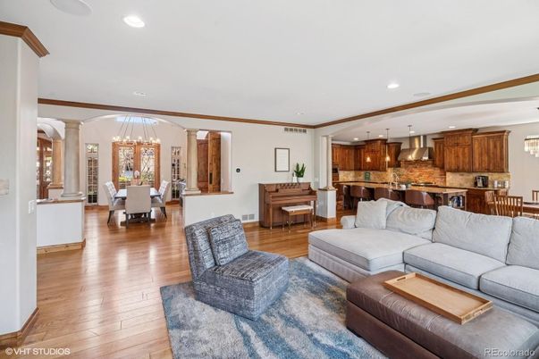 Chandelier, Dining room, Interior, Kitchen, Living room, Pendant Lights, Piano, Recessed Lighting, Wood Texture Flooring