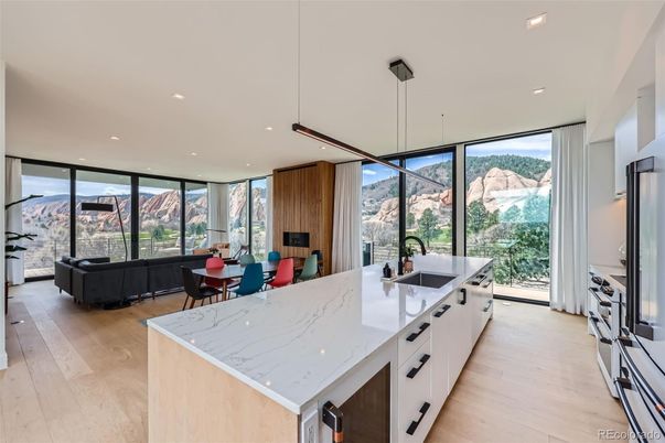 Dining room, Interior, Kitchen, Living room, Pendant Lights, Recessed Lighting, Stainless Steel Appliances, Wood Texture Flooring