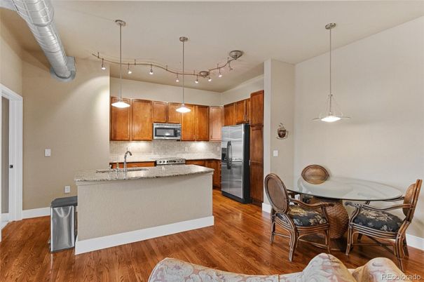 Dining room, Interior, Kitchen, Pendant Lights, Stainless Steel Appliances, Wood Texture Flooring
