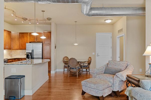 Dining room, Interior, Kitchen, Living room, Pendant Lights, Stainless Steel Appliances, Wood Texture Flooring