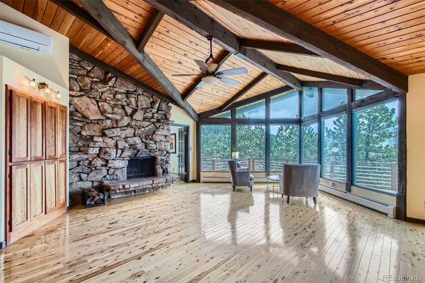 Empty room, Fireplace, Interior, Stone Walls, Sun Room, Wooden Beams, Wooden Ceilings, Wood Texture Flooring