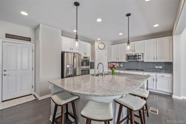 Interior, Kitchen, Pendant Lights, Recessed Lighting, Stainless Steel Appliances, Wood Texture Flooring