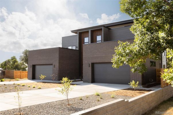 Attached, Exterior, Facade, Brick Facade, Modern