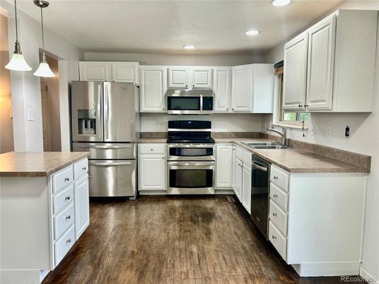 Interior, Kitchen, Pendant Lights, Recessed Lighting, Stainless Steel Appliances, Wood Texture Flooring