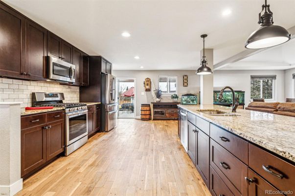 Interior, Kitchen, Pendant Lights, Recessed Lighting, Stainless Steel Appliances, Wood Texture Flooring