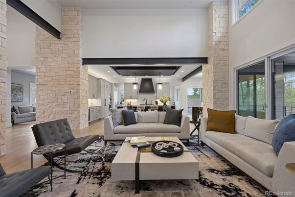 Interior, Kitchen, Living room, Pendant Lights, Recessed Lighting, Stainless Steel Appliances, Stone Walls, Wood Texture Flooring