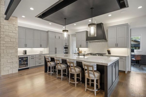 Interior, Kitchen, Pendant Lights, Recessed Lighting, Stainless Steel Appliances, Stone Walls, Wood Texture Flooring