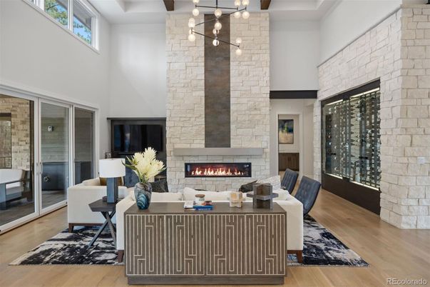 Fireplace, Interior, Living room, Pendant Lights, Stone Walls, Wine Storage, Wood Texture Flooring