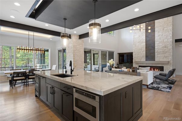 Dining room, Fireplace, Interior, Kitchen, Living room, Pendant Lights, Recessed Lighting, Stone Walls, Wood Texture Flooring