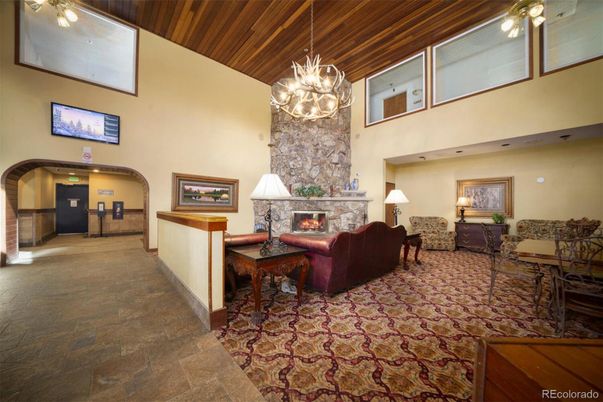 Chandelier, Fireplace, Interior, Living room, Pendant Lights, Wooden Ceilings
