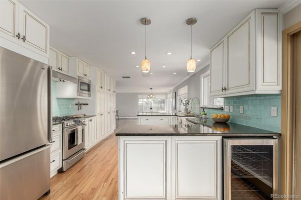 Interior, Kitchen, Pendant Lights, Recessed Lighting, Stainless Steel Appliances, Wood Texture Flooring