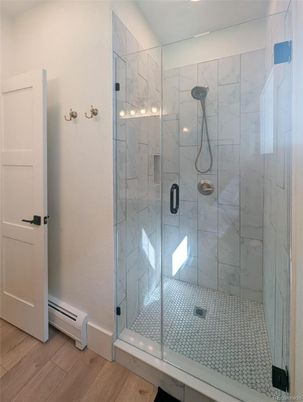 Bathroom, Glass Shower, Interior, Marble Walls, Wood Texture Flooring