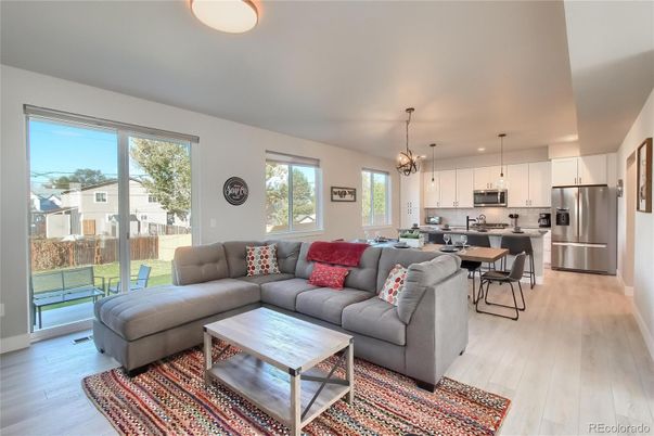 Dining room, Interior, Kitchen, Living room, Pendant Lights, Recessed Lighting, Stainless Steel Appliances, Wood Texture Flooring
