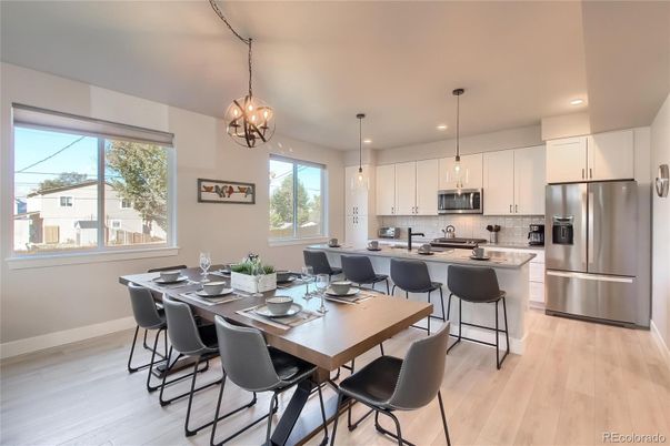 Dining room, Interior, Kitchen, Pendant Lights, Recessed Lighting, Stainless Steel Appliances, Wood Texture Flooring