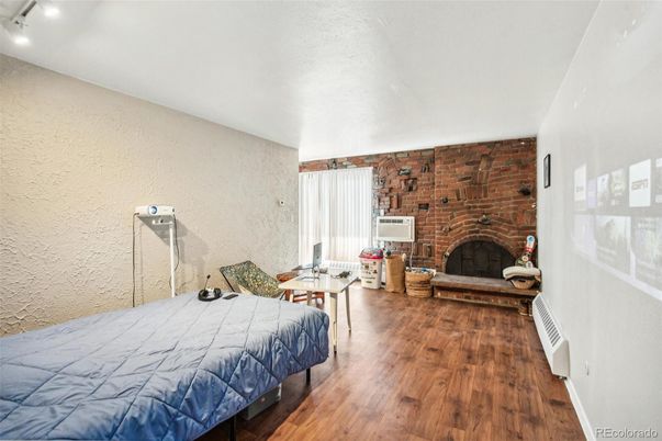 Bedroom, Fireplace, Interior, Stone Walls, Wood Texture Flooring