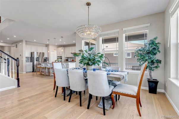 Chandelier, Dining room, Interior, Kitchen, Pendant Lights, Recessed Lighting, Stainless Steel Appliances, Wood Texture Flooring