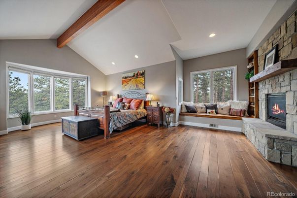 Bedroom, Fireplace, Interior, Recessed Lighting, Stone Walls, Wooden Beams, Wood Texture Flooring