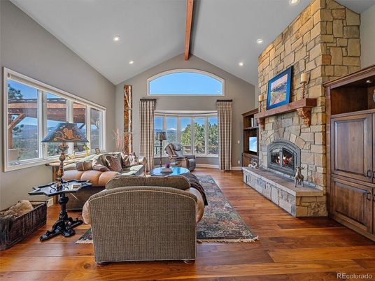 Fireplace, Interior, Living room, Recessed Lighting, Stone Walls, Wooden Beams, Wood Texture Flooring