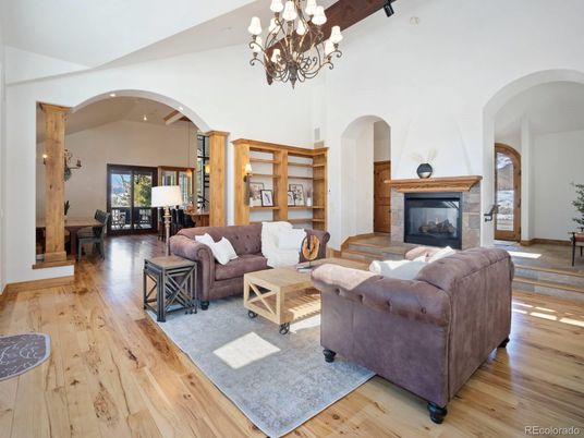 Chandelier, Fireplace, Interior, Living room, Piano, Wooden Beams, Wood Texture Flooring