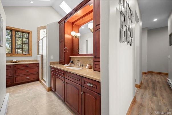 Bathroom, Dual Sink Vanities, Interior, Recessed Lighting, Wood Texture Flooring