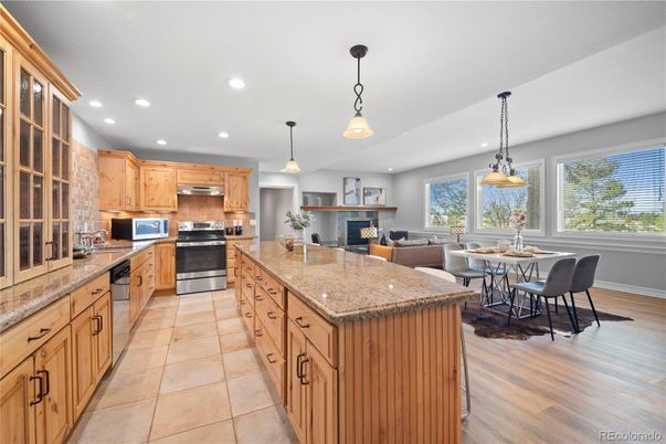 Dining room, Interior, Kitchen, Pendant Lights, Recessed Lighting, Stainless Steel Appliances, Wood Texture Flooring