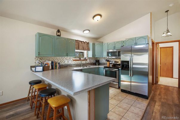 Interior, Kitchen, Pendant Lights, Stainless Steel Appliances, Wood Texture Flooring