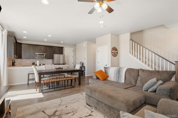 Dining room, Interior, Kitchen, Living room, Recessed Lighting, Stainless Steel Appliances, Wood Texture Flooring