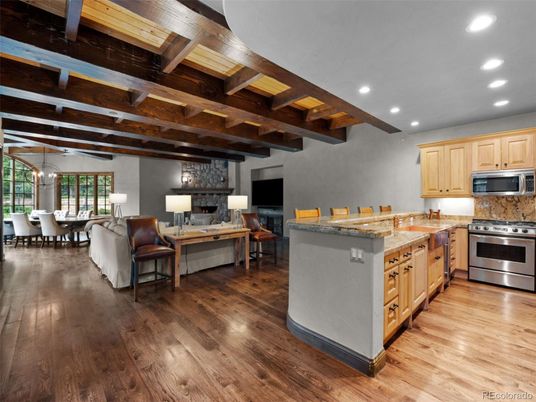 Dining room, Interior, Kitchen, Living room, Pendant Lights, Recessed Lighting, Stainless Steel Appliances, Wooden Beams, Wood Texture Flooring