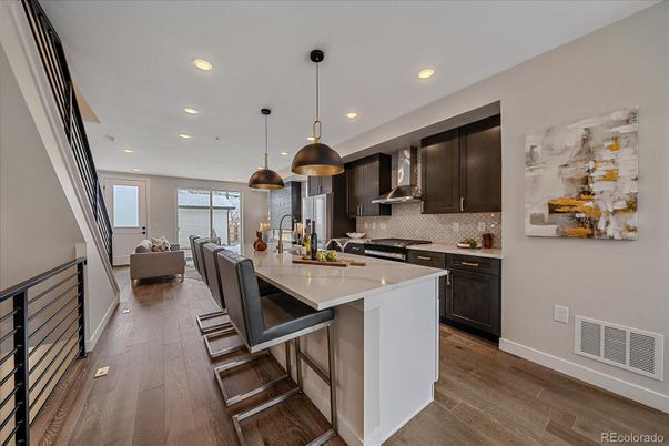Dining room, Interior, Kitchen, Living room, Pendant Lights, Recessed Lighting, Stainless Steel Appliances, Wood Texture Flooring