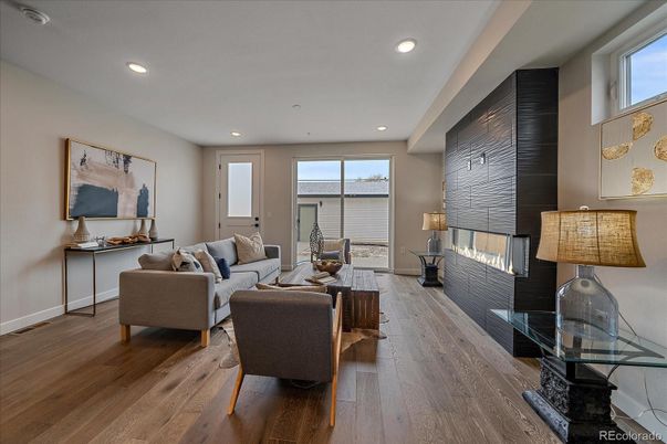Fireplace, Interior, Living room, Recessed Lighting, Wood Texture Flooring