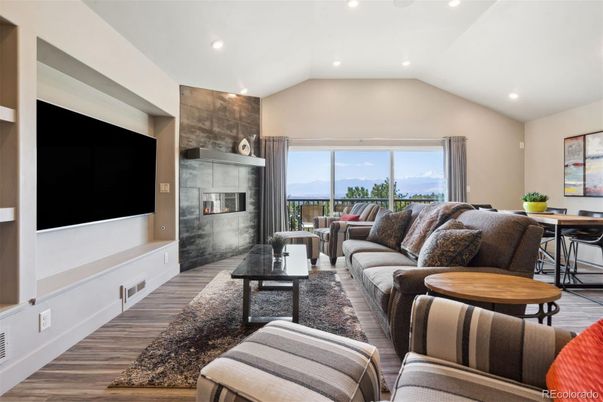 Dining room, Fireplace, Interior, Living room, Recessed Lighting, Wood Texture Flooring