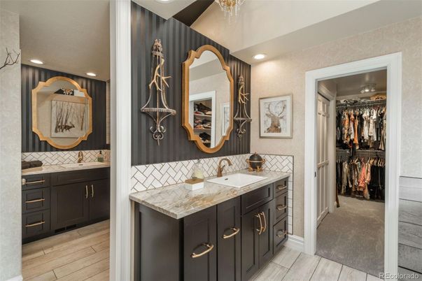 Bathroom, Dual Sink Vanities, Interior, Recessed Lighting, Walk-in Closets, Wood Texture Flooring